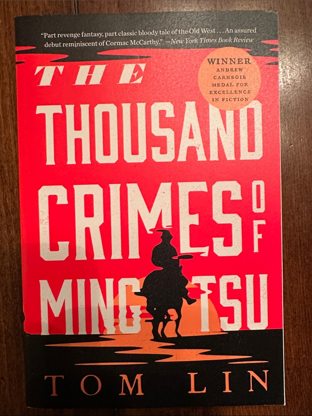 The Thousand Crimes of Ming Tsu by Tom Lin - Bold Red Cover